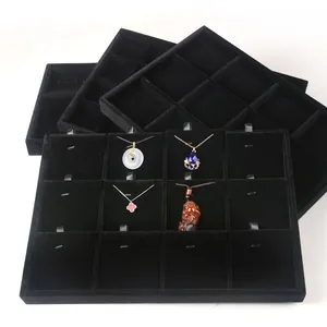 Black velvet jewelry display trays and organizers for necklaces pendants and earrings