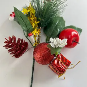 Detailed view of festive Christmas decorative pick with red pinecone and glitter ball
