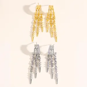 Detailed view of fashion irregular tassel hoop earrings with zirconia and spikes