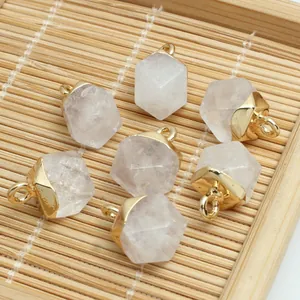 Detailed close-up showing faceted natural crystal pendants with elegant gold bail attachments