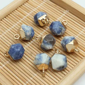 Macro view of multi-faceted blue natural stone pendants for DIY jewelry making