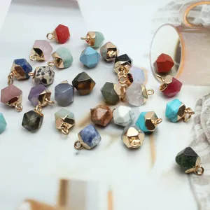 Collection of multifaceted natural gemstone pendants with gold loops for DIY jewelry making