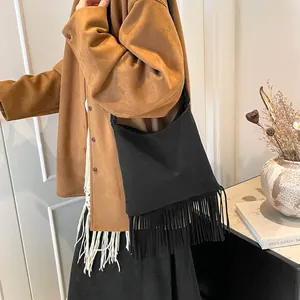 Vintage chic black faux suede fringe shoulder bag for women with large capacity design