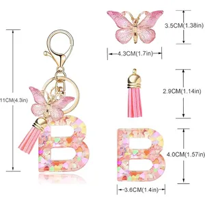 Detailed dimensions for initial B resin keychain with butterfly charm and pink tassel