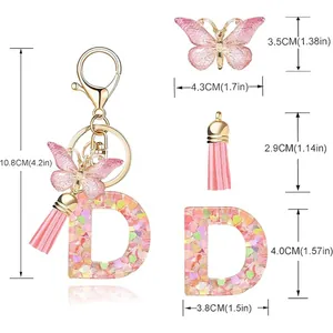 Detailed dimensions of butterfly and tassel letter D heart sequin keychain