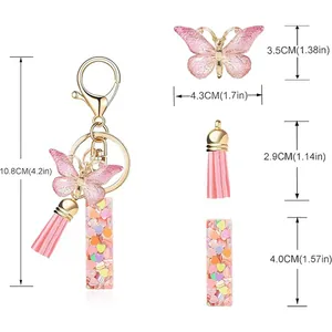 Detailed dimension breakdown of the pink butterfly tassel keychain with heart sequin charms