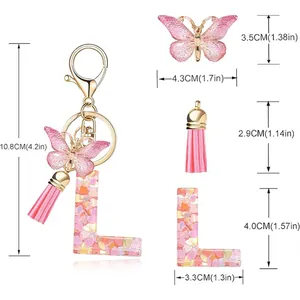 Detailed size specifications for pink heart sequin letter L keychain with butterfly and tassel