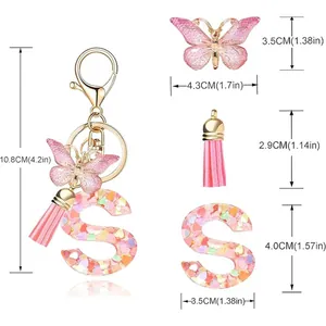 Detailed dimension diagram for heart sequin resin letter S keychain with pink butterfly