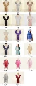 Collection of metallic rayon fringe shawls in 17 diverse colors for elegant styling.
