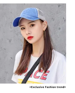 Fashionable Asian model wearing a blue washed denim mesh baseball cap for summer sun protection.
