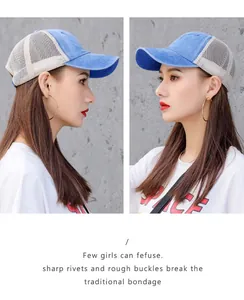 Side view detail of a washed blue and beige breathable mesh baseball cap on a model.