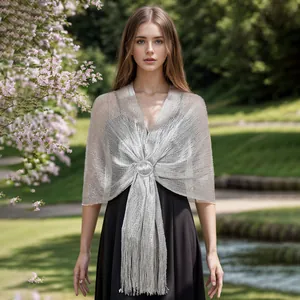 Elegant silver metallic mesh shawl wrap with fringe tassels and buckle detail for evening wear