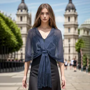 Elegant navy blue metallic thread shawl with fringe detail worn by model outdoors