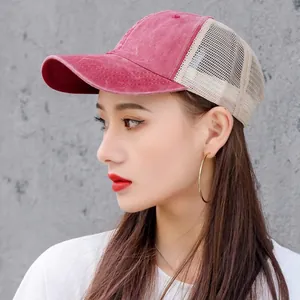Washed red cotton baseball cap with beige mesh back for sun protection and style