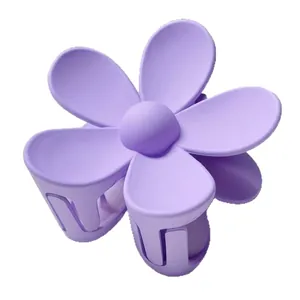 Elegant purple flower hair claw clip with matte finish for women's hairstyling
