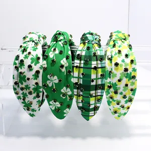 St. Patrick's Day knotted headbands with green shamrock prints and shiny rhinestones