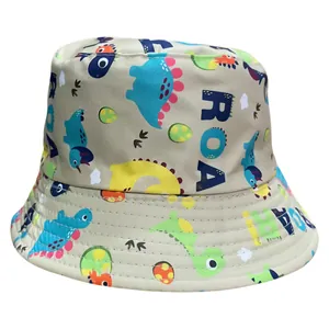 Close-up of children's khaki bucket hat featuring colorful dinosaur prints and ROAR text.