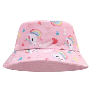 Close-up view of a pink kids bucket hat featuring colorful unicorn and heart patterns