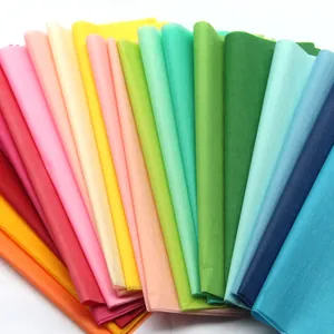 Detailed view showing a vibrant fan of 17g colorful tissue paper for DIY and packaging
