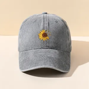 Berretto da baseball in cotone grigio lavato con girasole ricamato