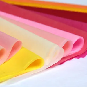 Close-up of vibrant 17g colored tissue paper sheets for gift wrapping and DIY