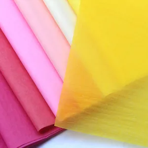 Macro view showing the vibrant colors and delicate texture of premium tissue paper