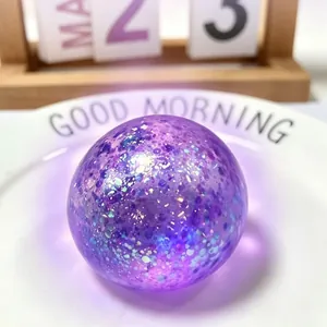 Purple glitter maltose stress ball, slow rebound sensory squeeze toy for stress relief.