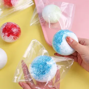 Colorful ice-cube squishy ball toy for stress relief and slow rebound play.