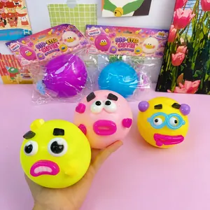 Creative colorful big-eyed dog face squishy stress relief toys in pink and yellow finish