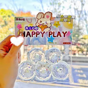 Detailed view of transparent donut squishy toy set with cute character packaging display