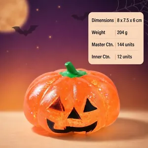 Soft Halloween pumpkin squishy toy with glitter texture and scary face