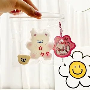 Detailed view of cute white bear squishy decompression toy inside its transparent packaging bag