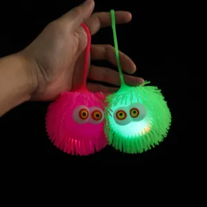 Palla antistress riccio luminosa con luci LED lampeggianti e grandi occhi per bambini