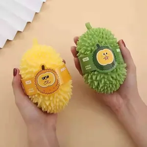 Realistische Durian-Quetschspielzeuge in Gelb und Grün zum Stressabbau und Spielen