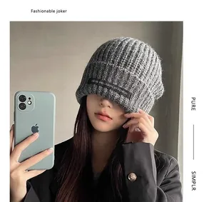 Comfortable stylish grey knitted slouchy beanie for winter warmth and trendy street style wear