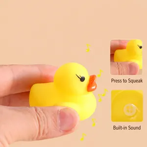 Detail view showing the squeak feature and bottom sounder of yellow rubber duck