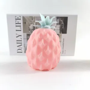 Giocattolo antistress a forma di ananas rosa con foglie azzurre per bambini e adulti