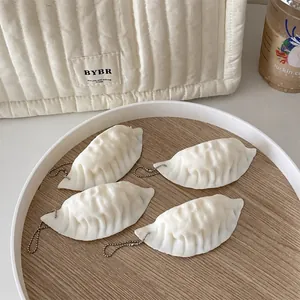 Kreativer realistischer Knödel-Squishy-Spielzeug-Schlüsselanhänger für Studenten
