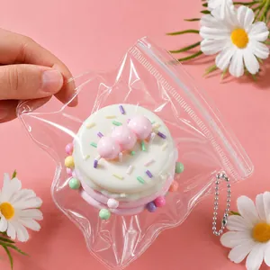 Simpatico giocattolo squishy a rimbalzo lento a forma di torta con confezione trasparente