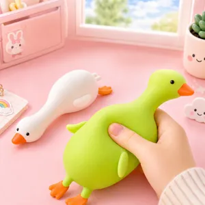Cute cartoon duck stress relief squishy toy in white and green with soft TPR texture