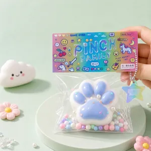 Χαριτωμένο μπλε και λευκό squishy παιχνίδι πατούσας γάτας σε πολύχρωμη συσκευασία λιανικής