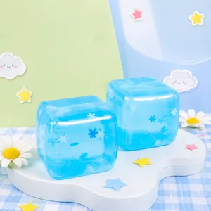 Two pieces of translucent blue snowflake patterned ice cube squishy slow rebound toys