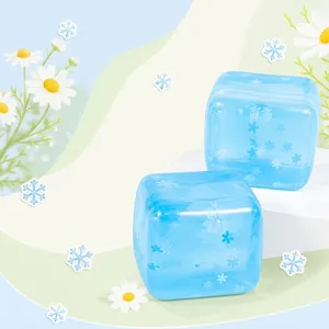 Translucent light blue ice cube squishy toy with snowflake pattern for stress relief