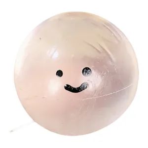 Palla antistress rosa semitrasparente con una simpatica faccina sorridente minimalista