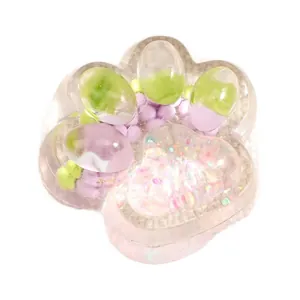 Lindo juguete squishy de pata de gato con textura transparente de gelatina para el estrés