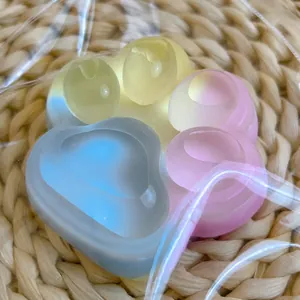 Macro view of a translucent gradient cat paw stress relief squeeze toy