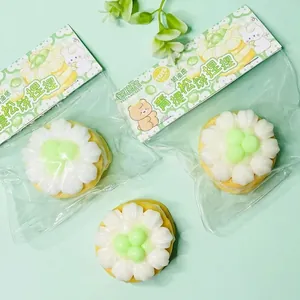 Close-up of the green grape pancake squeeze toy showing product dimensions and texture.