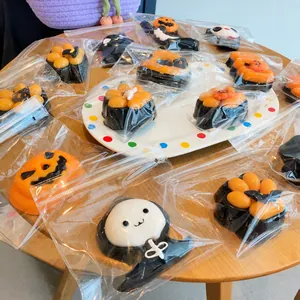 Variety of Halloween-themed soft squeeze toys individually packed in clear plastic bags