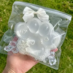 Giant translucent cat paw squishy toy with pearl and snowflake decorations