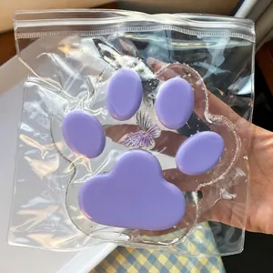 Vista detallada del juguete squishy pata de gato púrpura gigante en empaque de 14 cm